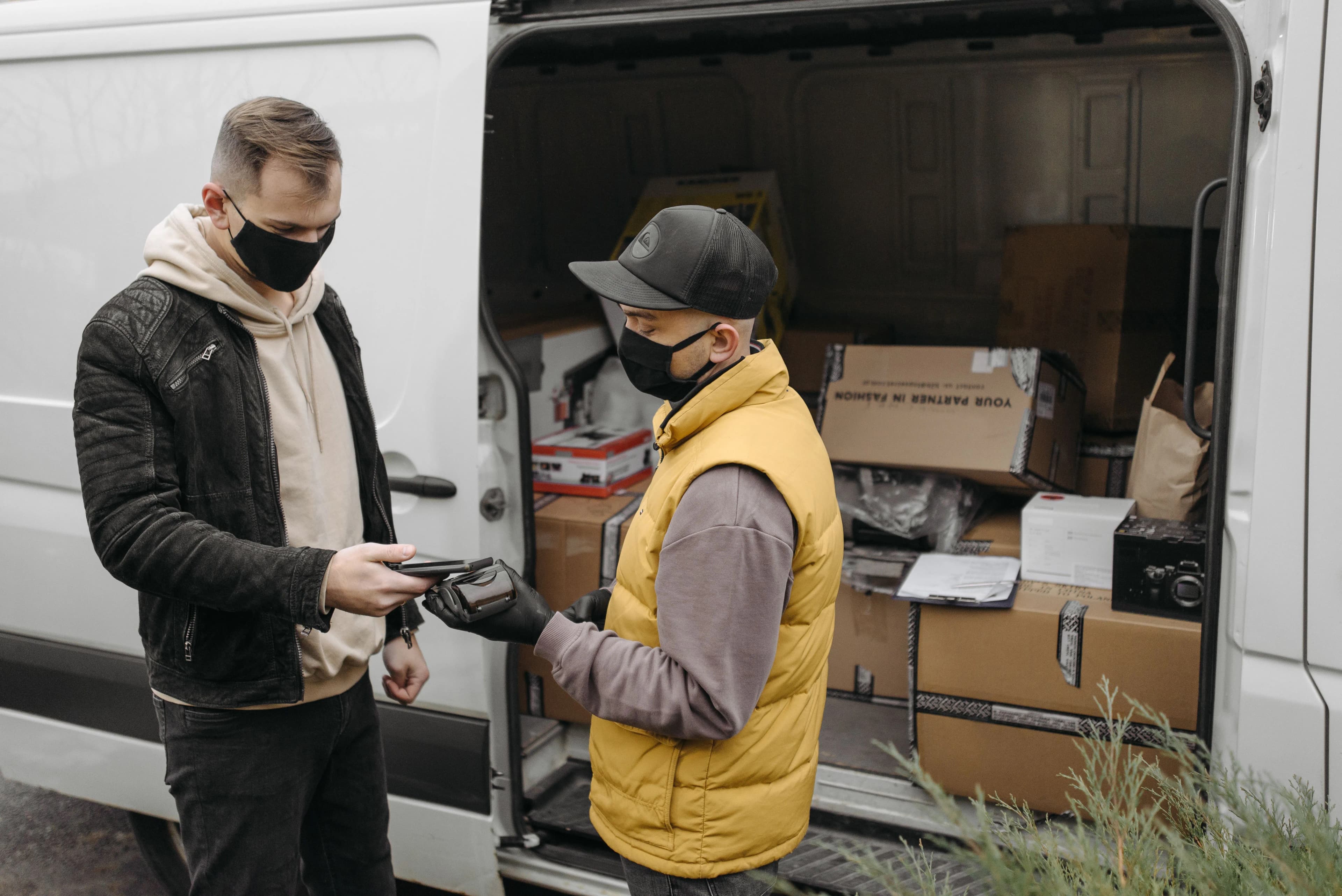Courier handing over a parcel